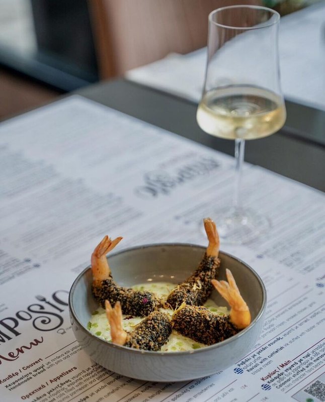 Shrimp tempura with cuttlefish ink, tzatziki espuma, and basil oil